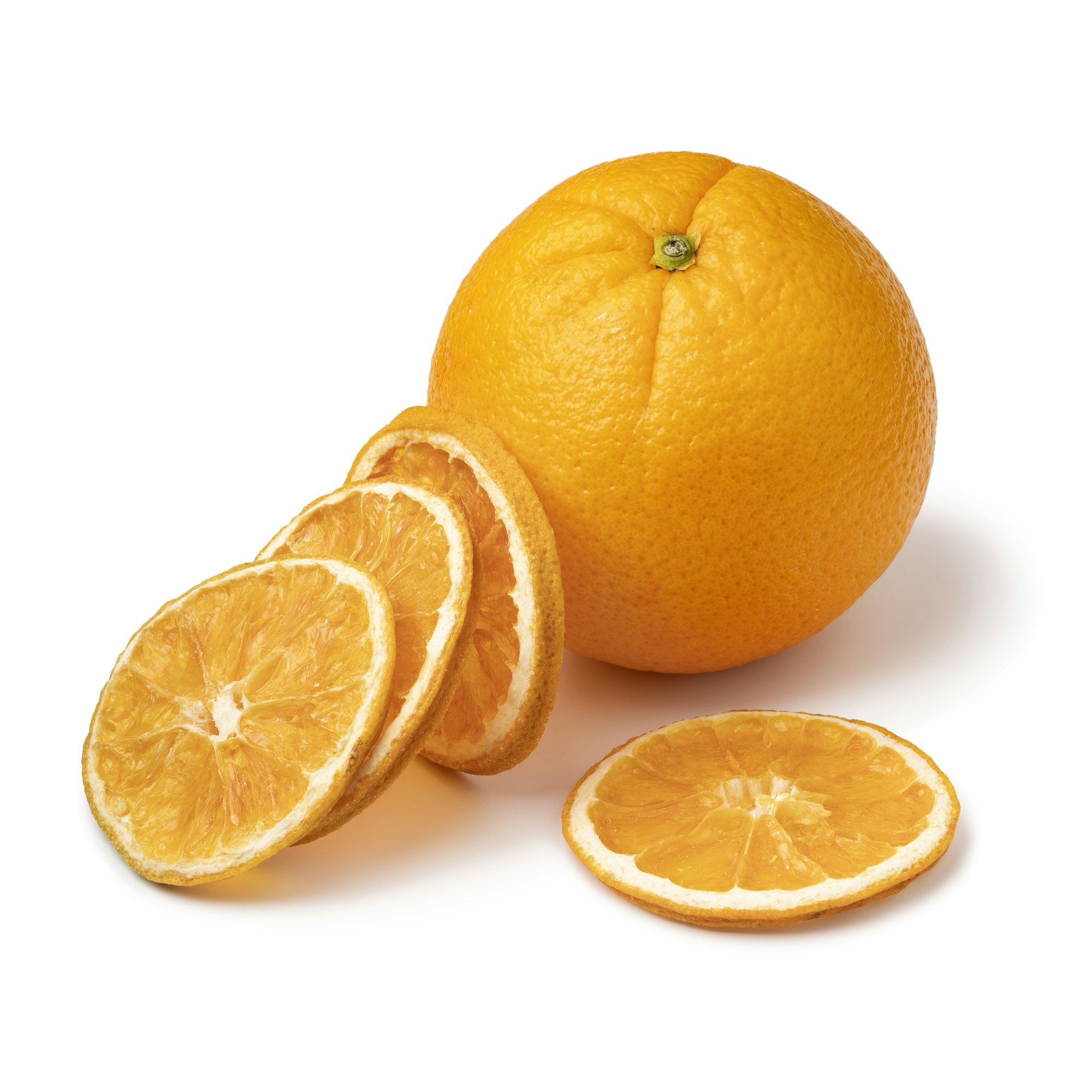 Single fresh orange and dried orange slices isolated on white background